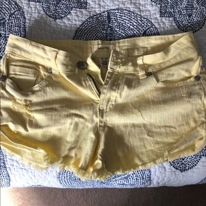 Three pairs of Blue Asphalt jean shorts.